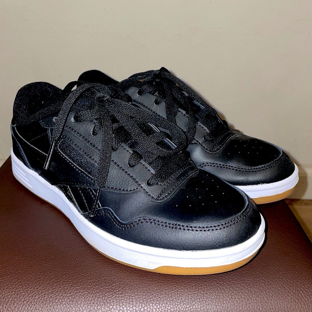 Black Reebok sneakers
